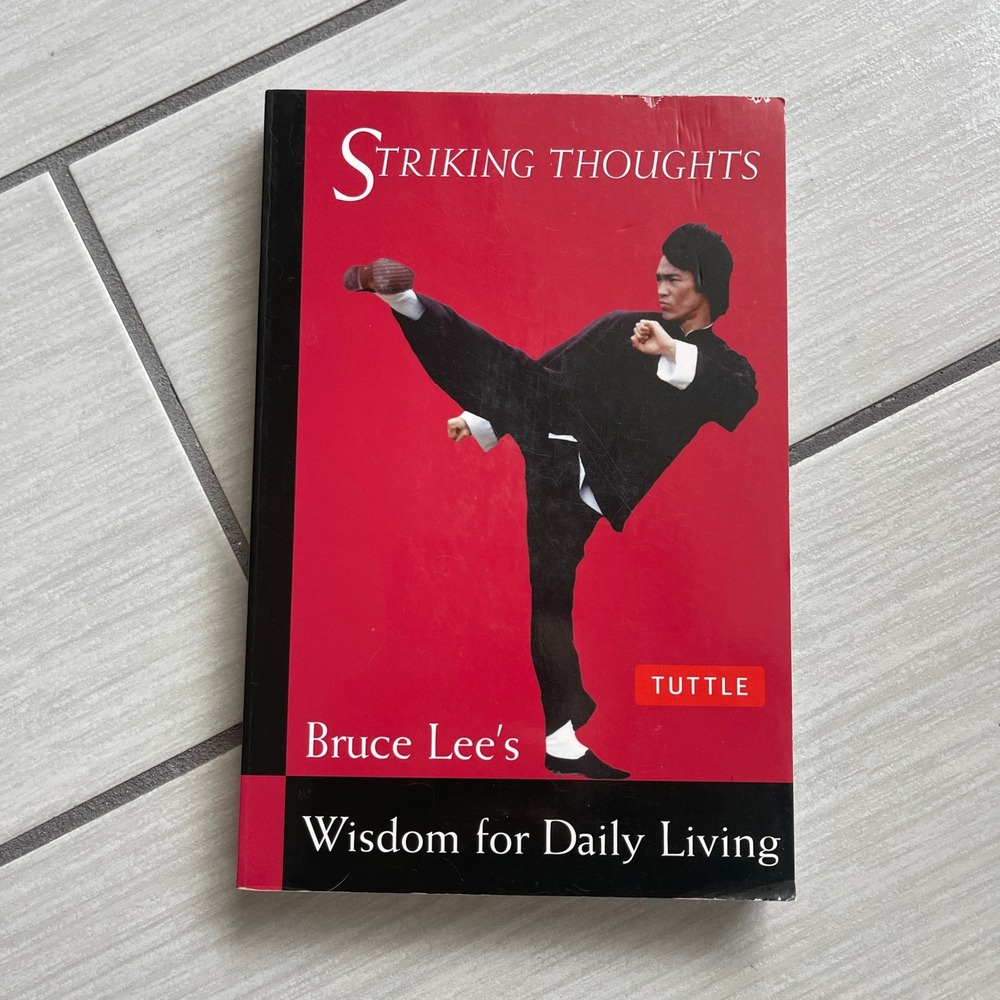 Striking Thoughts Bruce Lee Wisdom for Daily Living Tuttle Paperback Book